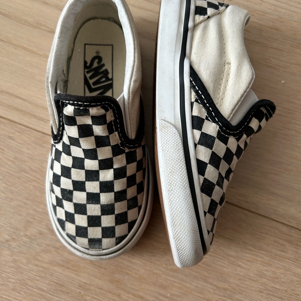 Vans Black and White Checkerboard Slip-On Sneakers